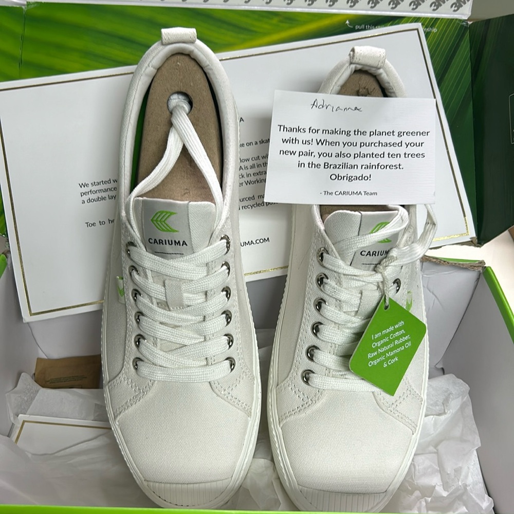 Unisex low off white canvas sneaker.  New in box
